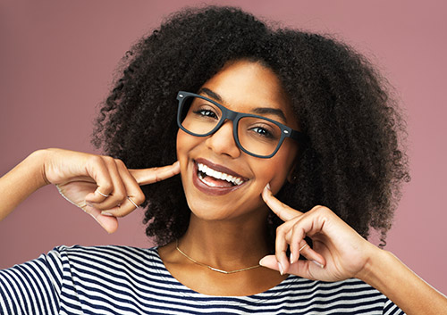 Dentist discussing when tooth extraction may be needed